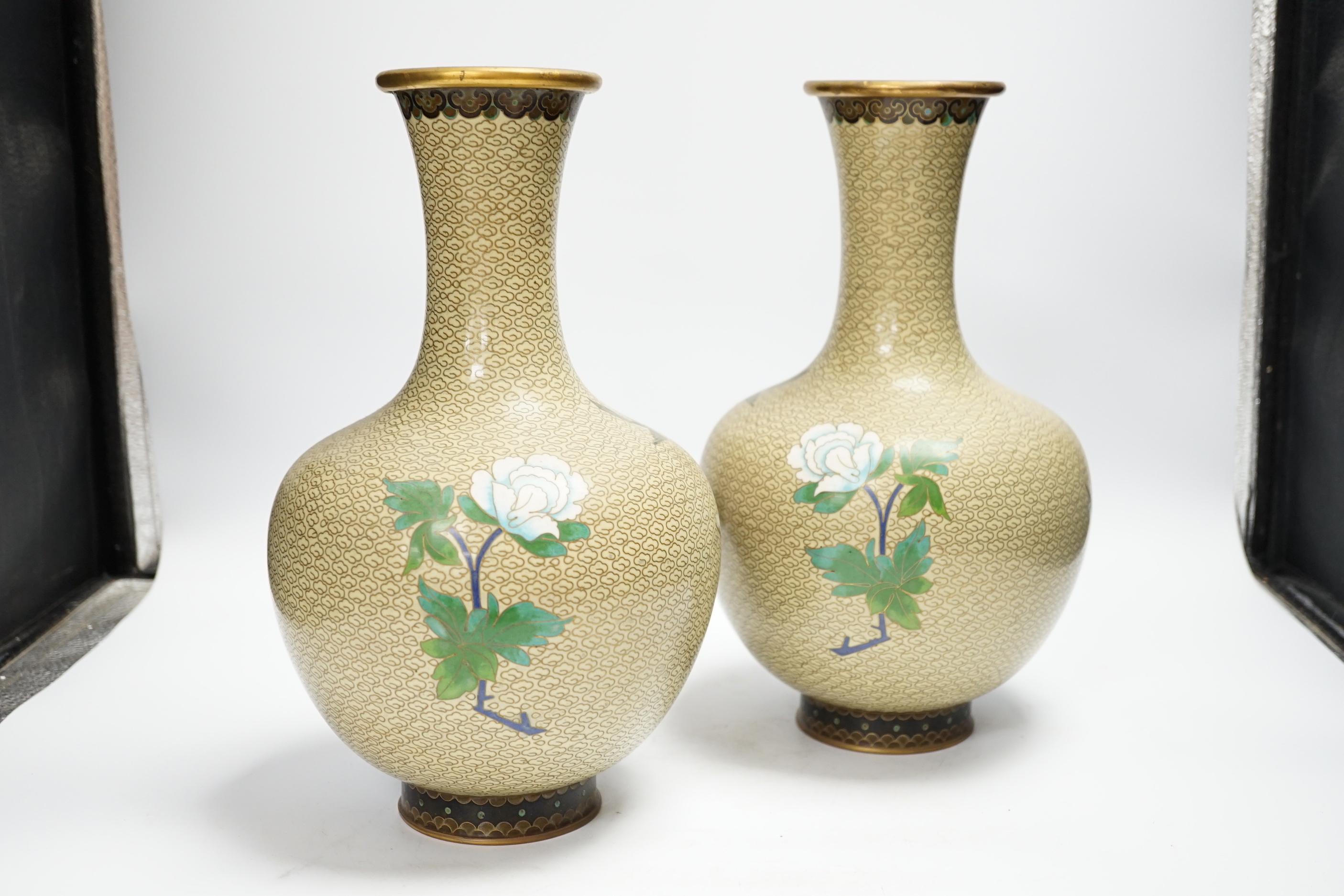 A pair of Chinese cloisonné enamel blossom decorated vases, 30cm high